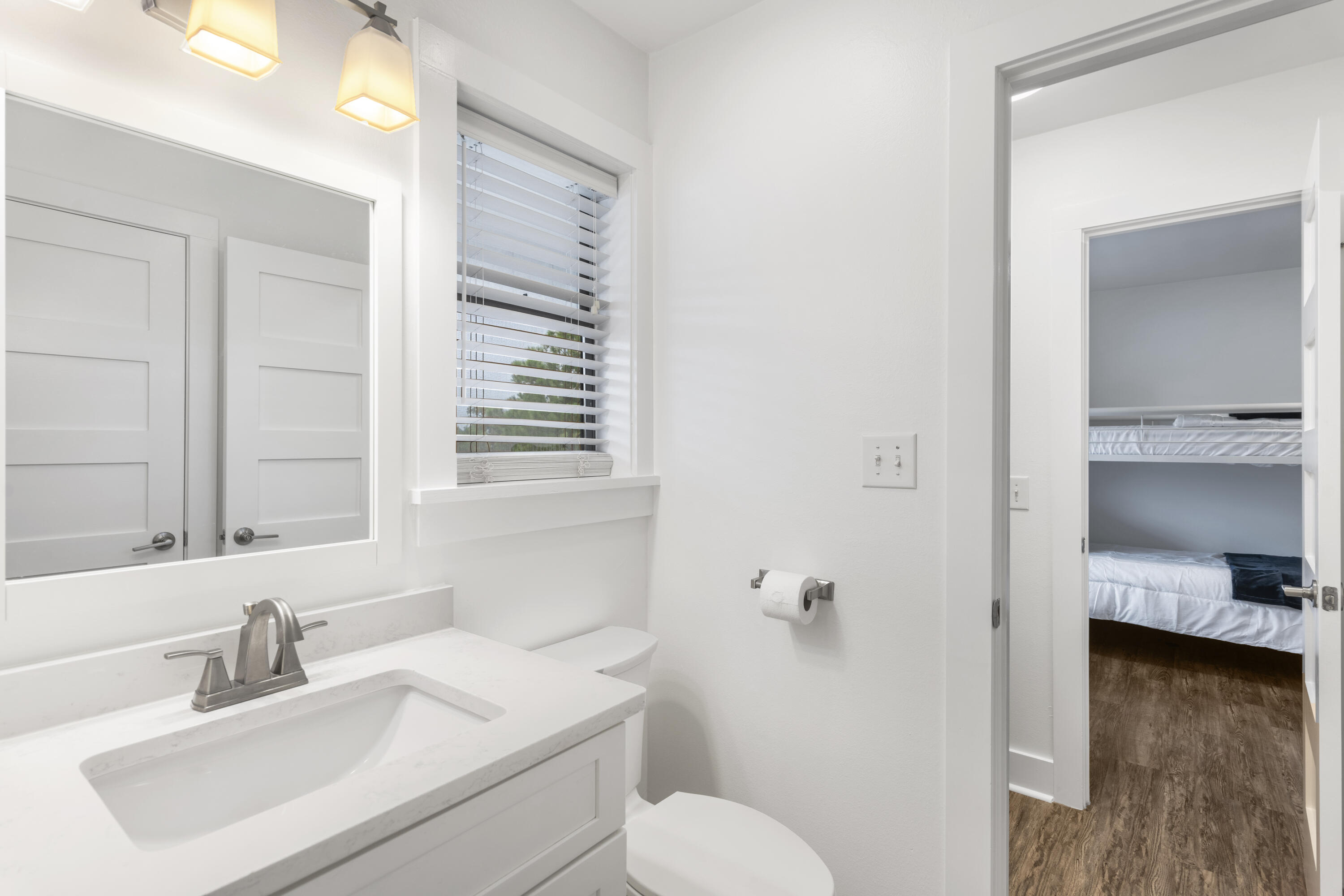 3799 East County Highway 30A, Unit F13 Santa Rosa Beach, FL 32459 - Photo 15 of 30 a bathroom with a sink toilet and a mirror