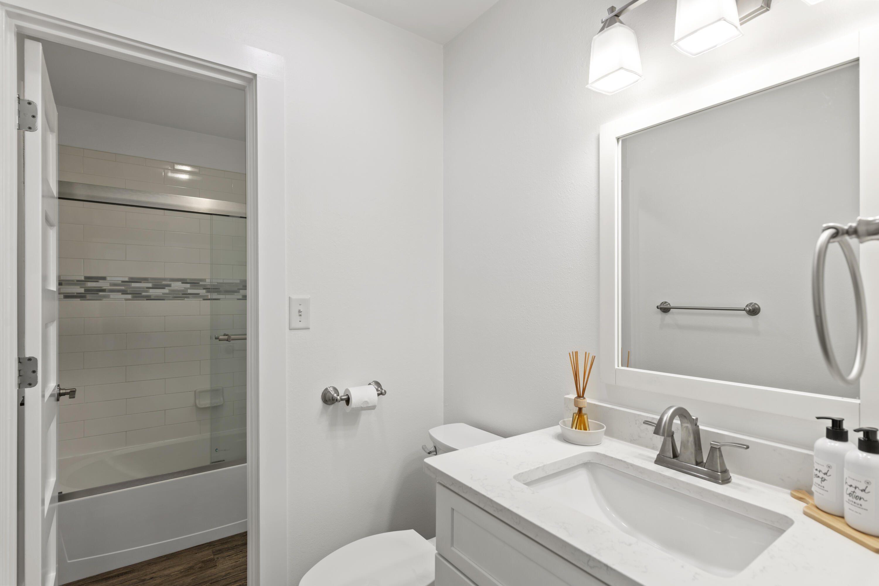 3799 East County Highway 30A, Unit F13 Santa Rosa Beach, FL 32459 - Photo 16 of 30 a bathroom with a granite countertop sink toilet and shower