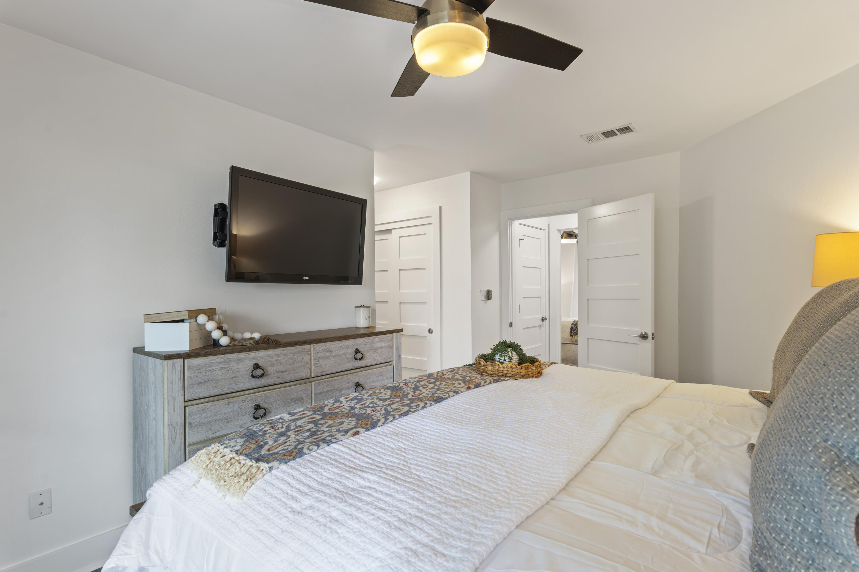 3799 East County Highway 30A, Unit F13 Santa Rosa Beach, FL 32459 - Photo 22 of 30 a bedroom with a bed and a flat tv screen on dresser