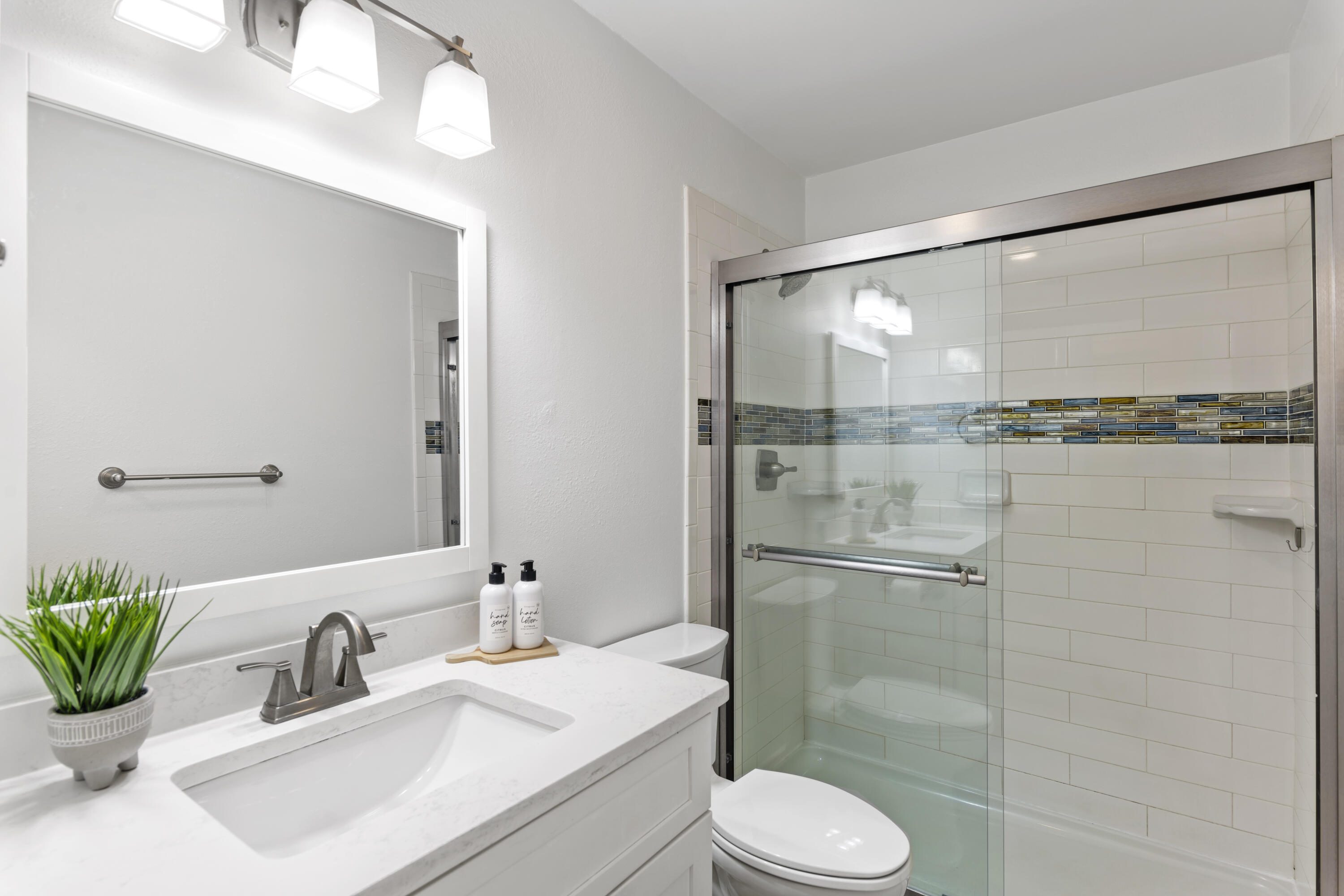 3799 East County Highway 30A, Unit F13 Santa Rosa Beach, FL 32459 - Photo 23 of 30 a bathroom with a sink toilet and shower