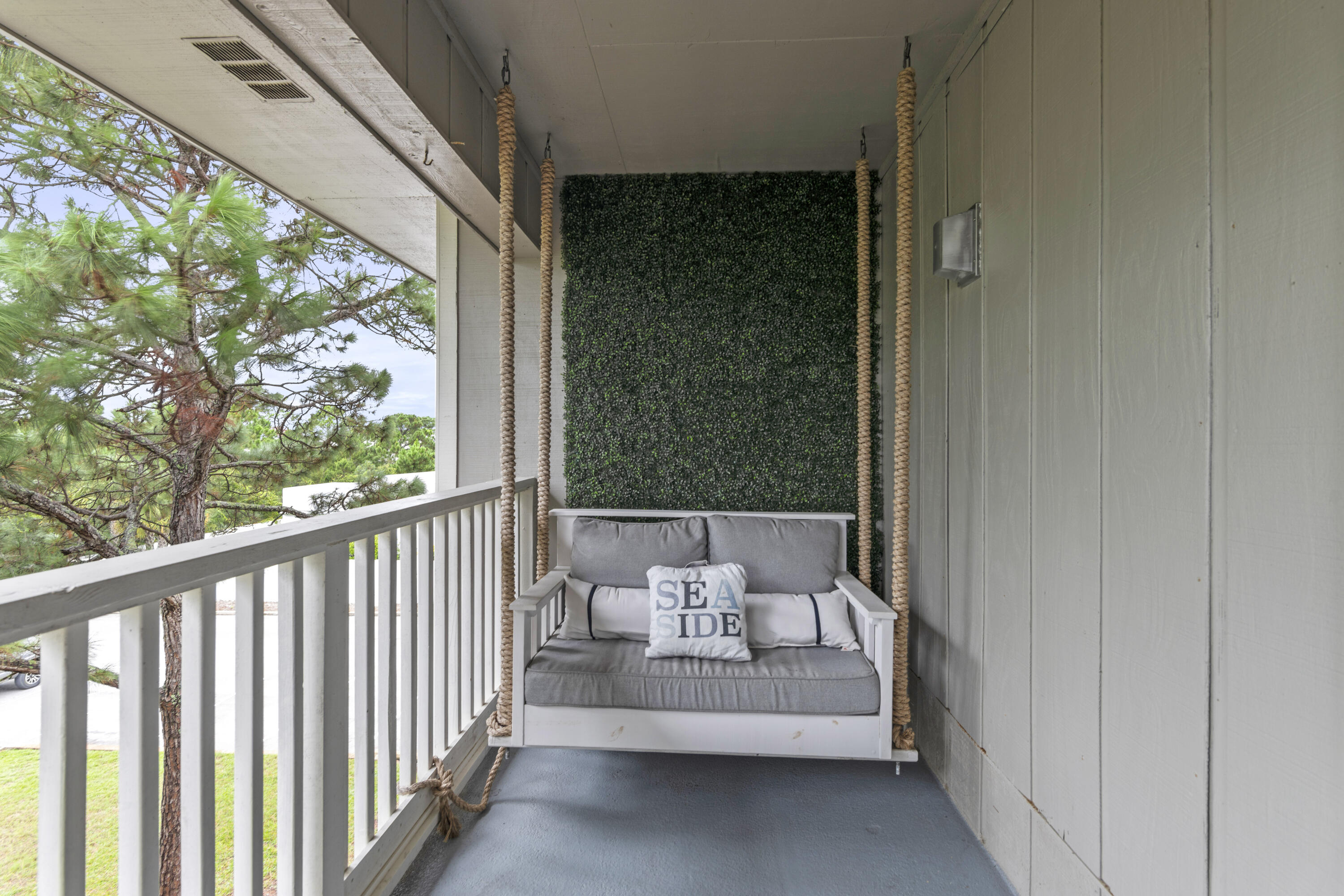 3799 East County Highway 30A, Unit F13 Santa Rosa Beach, FL 32459 - Photo 25 of 30 a view of a balcony with chair