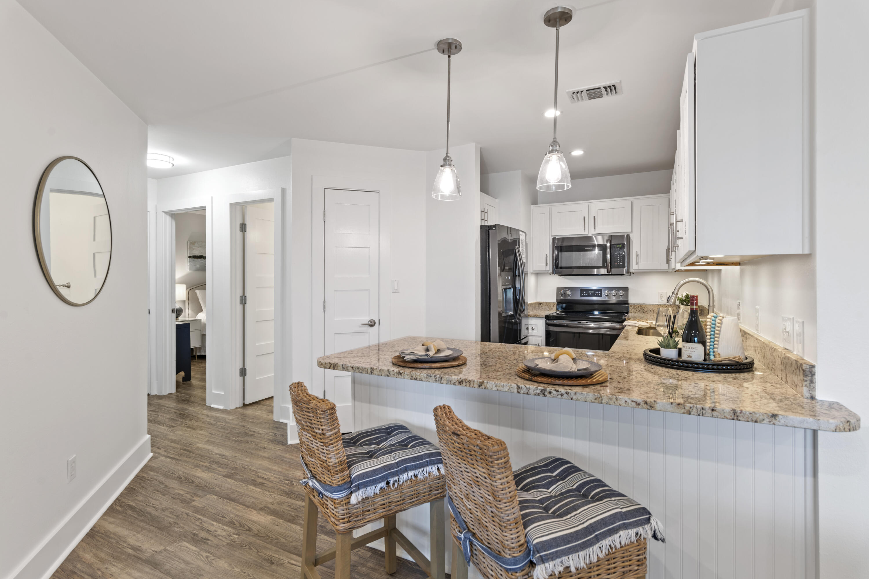 3799 East County Highway 30A, Unit F13 Santa Rosa Beach, FL 32459 - Photo 8 of 30 a kitchen with a refrigerator a sink and a stove