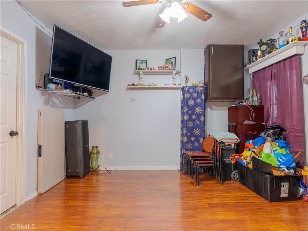 1211 Hoffman Avenue Long Beach, CA 90813 - Photo 11 of 33 a view of a livingroom with furniture and a flat screen tv
