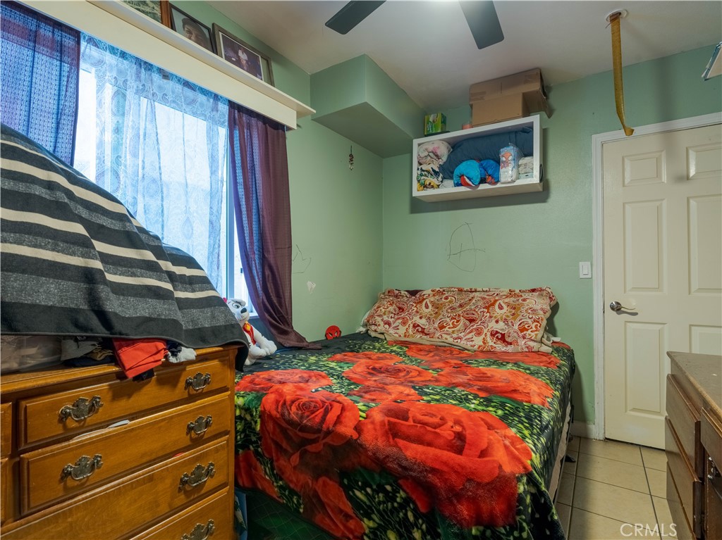 1211 Hoffman Avenue Long Beach, CA 90813 - Photo 19 of 33 a bedroom with a bed and a closet