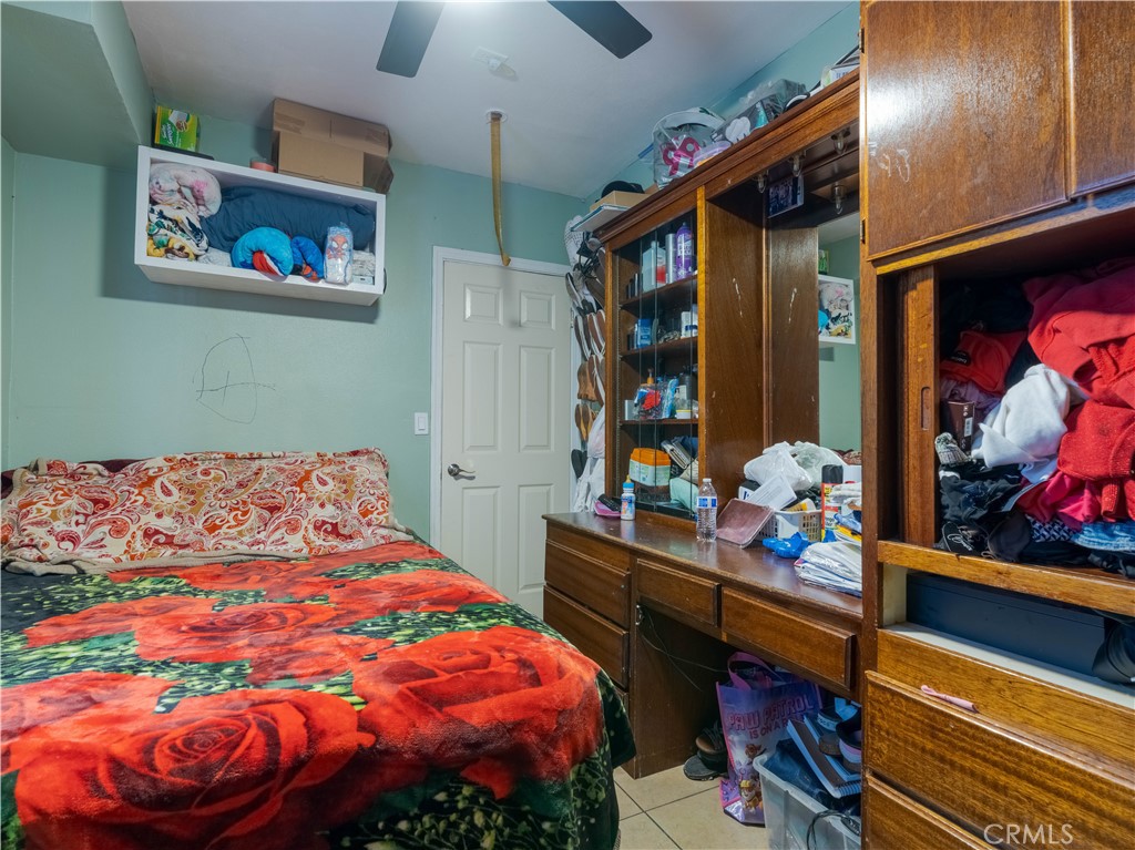 1211 Hoffman Avenue Long Beach, CA 90813 - Photo 20 of 33 a bedroom with a bed and a window