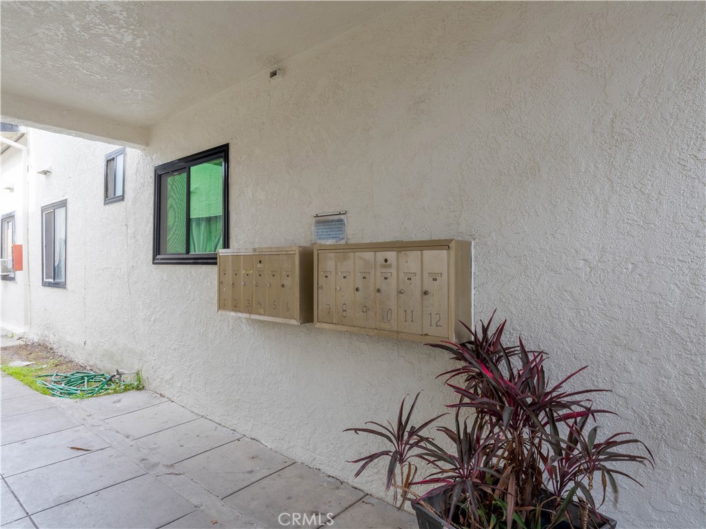 1211 Hoffman Avenue Long Beach, CA 90813 - Photo 26 of 33 a living room with furniture and a potted plant