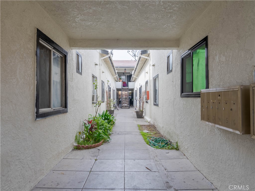 1211 Hoffman Avenue Long Beach, CA 90813 - Photo 27 of 33 a view of entryway with a flower garden