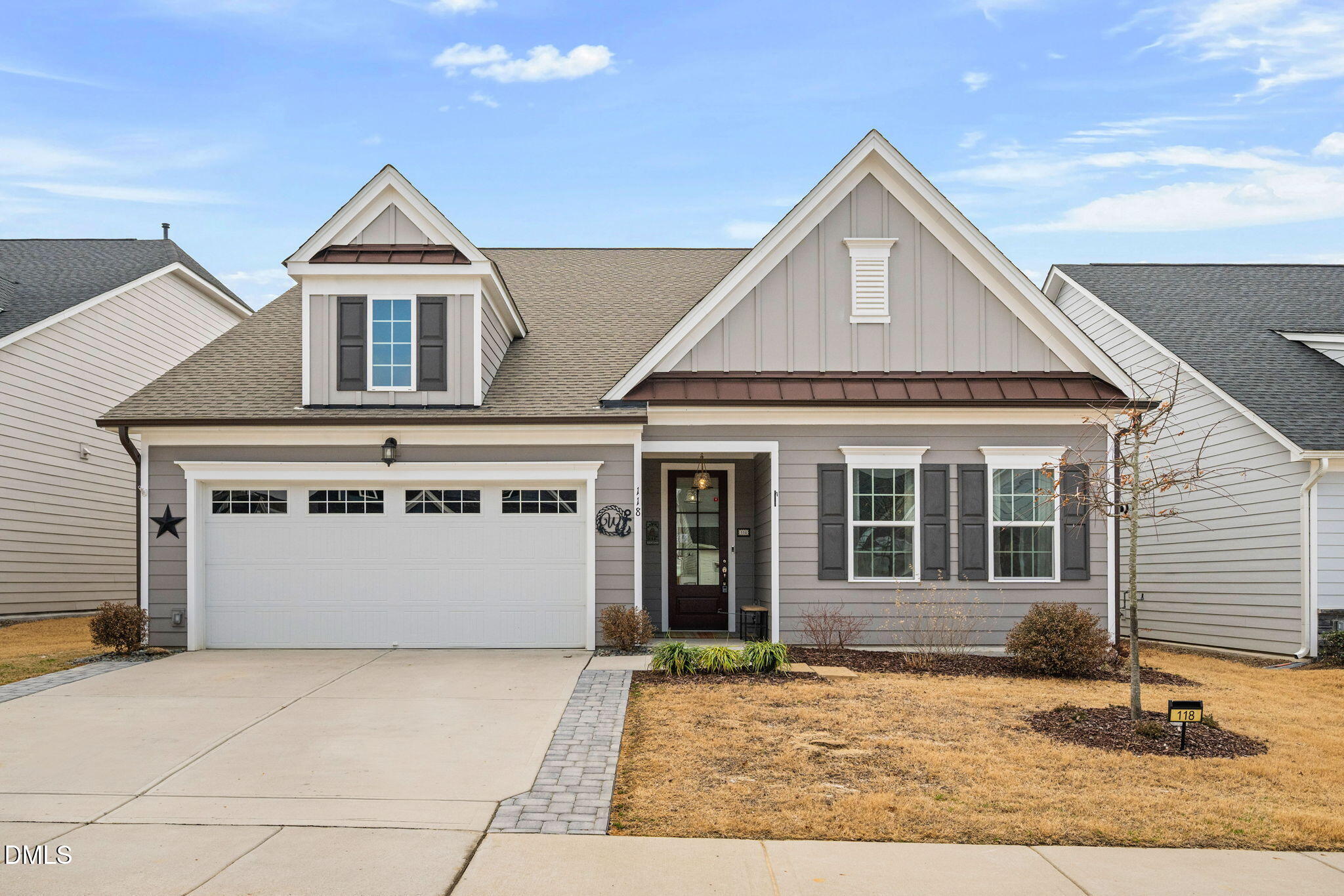 118 Mahogany Raleigh, NC 27610 - Photo 48 of 74 a front view of a house with a garage