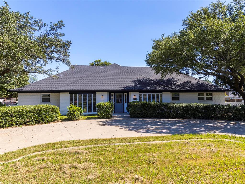 511 South Irick Street Pilot Point, TX 76258 - Photo 1 of 1 a front view of a house with a yard