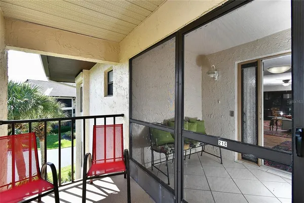 a view of balcony with furniture