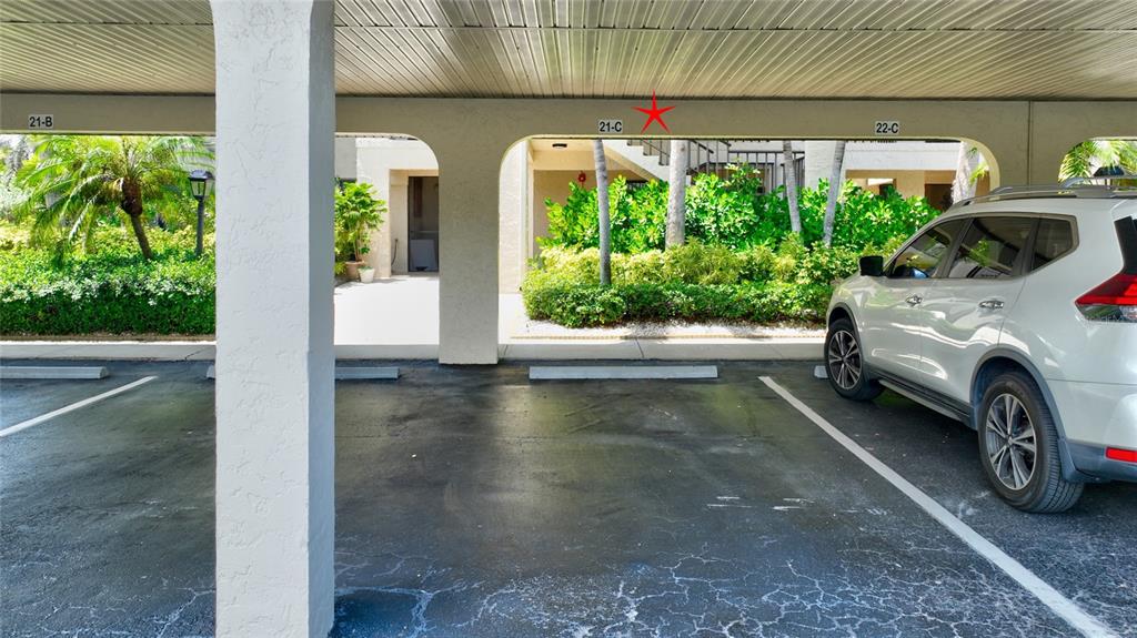 2 Pirates Lane, Unit 21C Punta Gorda, FL 33955 - Photo 29 of 36 a view of a car in garage