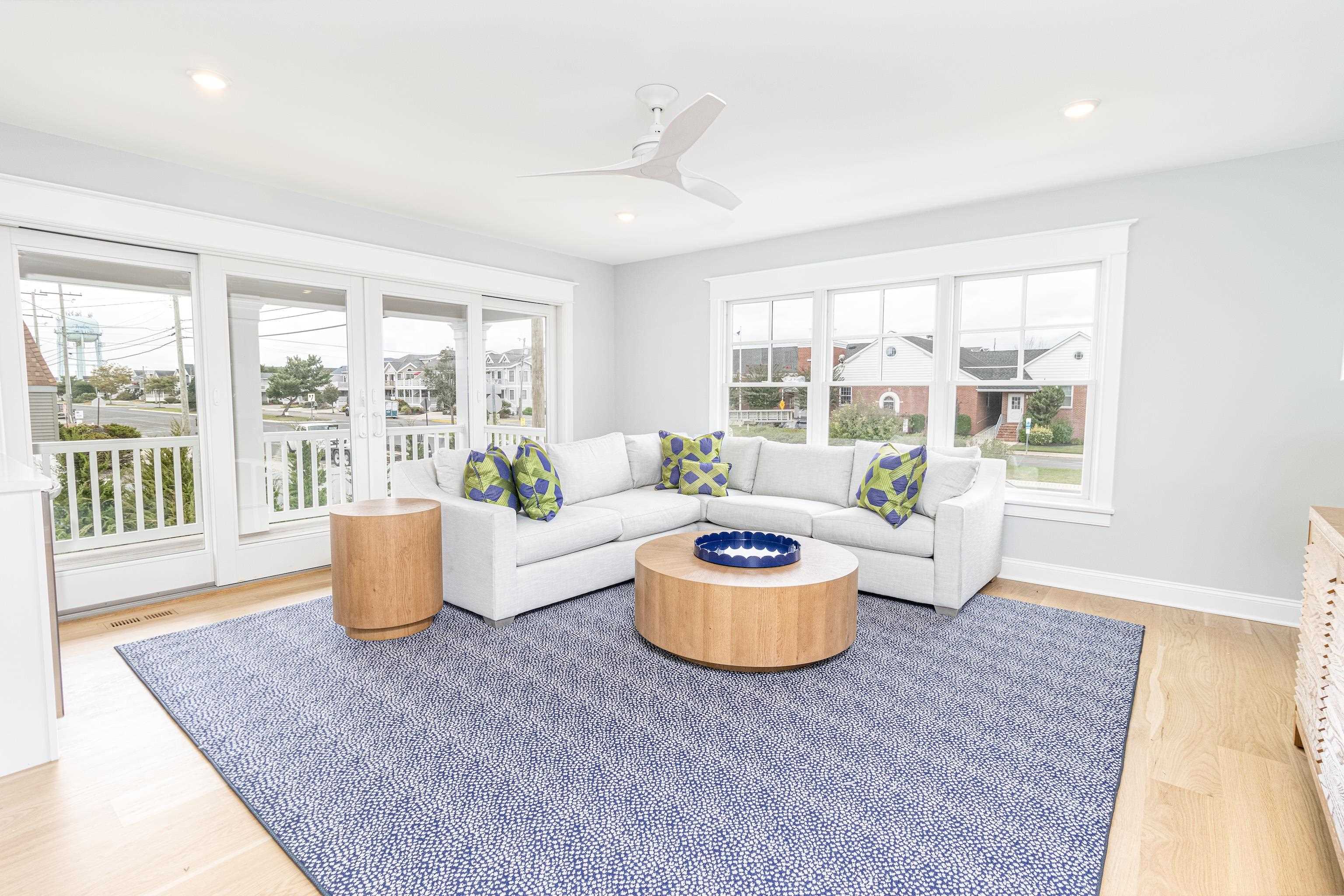 188 33rd Avalon, NJ 08202 - Photo 9 of 36 a living room with furniture and a large window