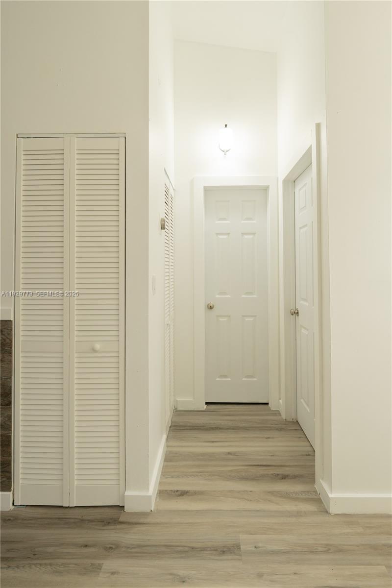 6725 Northwest 192nd Lane Hialeah, FL 33015 - Photo 9 of 29 a view of a bathroom with wooden floor