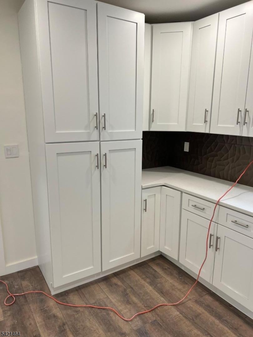 227 Palmer Street, Unit 2 Elizabeth, NJ 07202 - Photo 3 of 13 a kitchen with white cabinets and white appliances