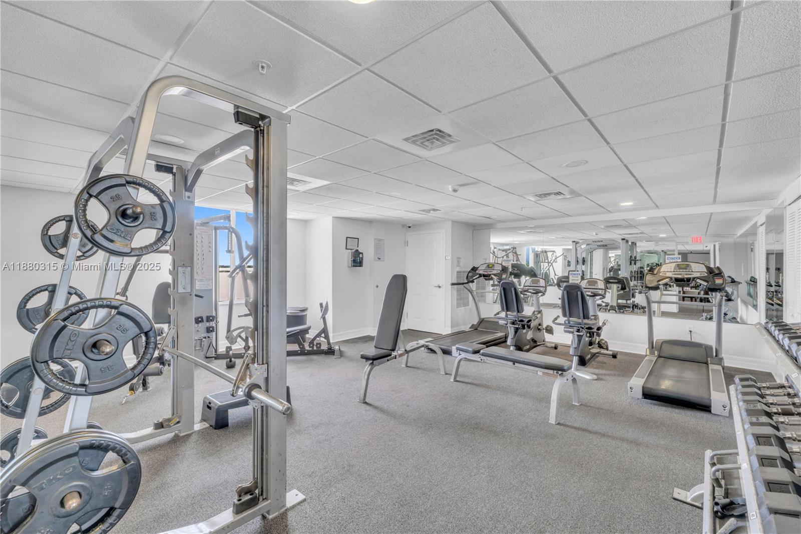 900 Southwest 8th Street, Unit 1110 Miami, FL 33130 - Photo 25 of 27 a view of a room with gym equipment