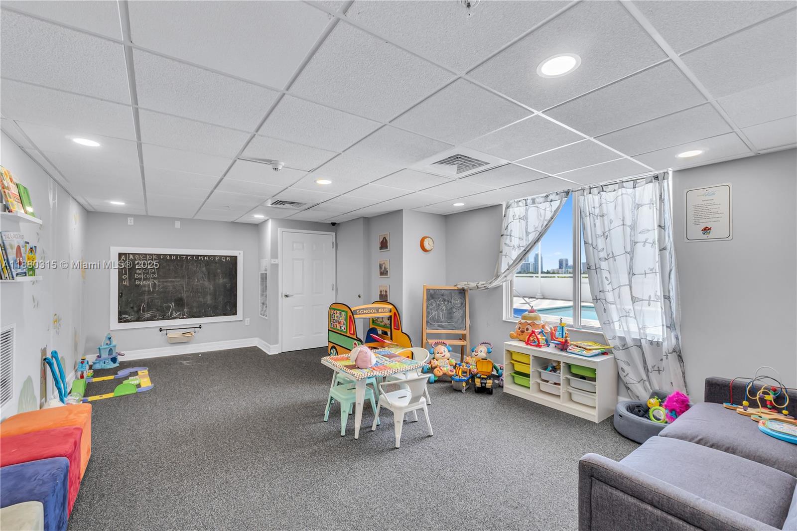 900 Southwest 8th Street, Unit 1110 Miami, FL 33130 - Photo 26 of 27 a play room with furniture