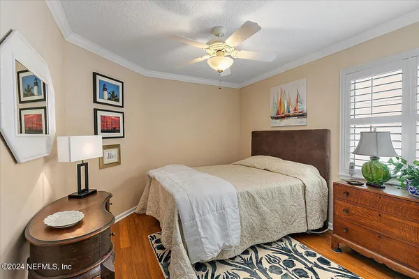 a bathroom with a sink toilet tub and shower