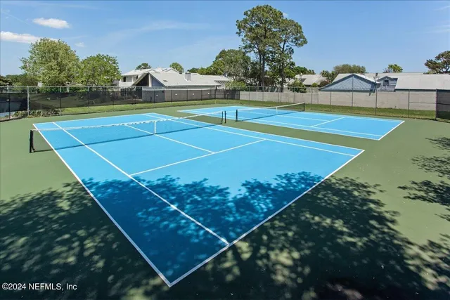 a view of a lake with a deck