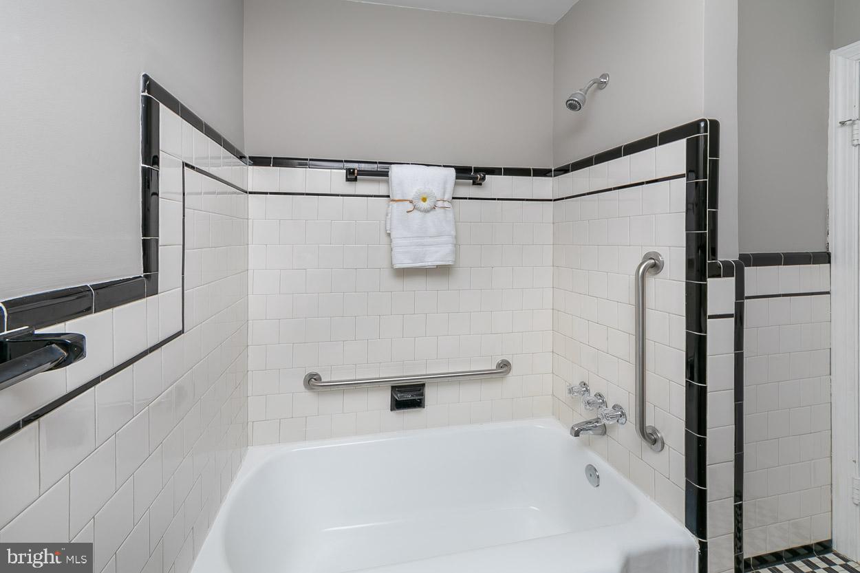404 Upland Road Pikesville, MD 21208 - Photo 27 of 34 Classic Black & White Subway Tile in Full Bath