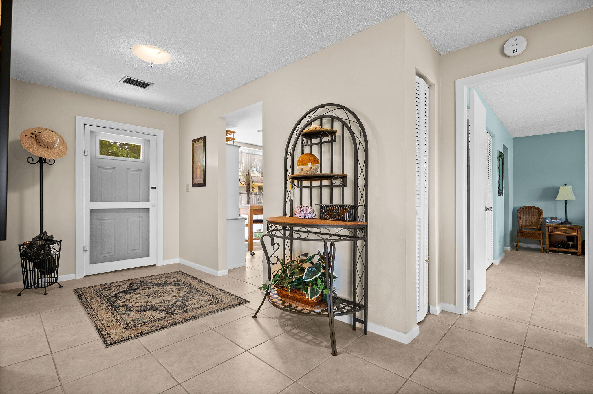 355 Palm Drive, Unit 2 Naples, FL 34112 - Photo 2 of 30 a view of living room filled with furniture