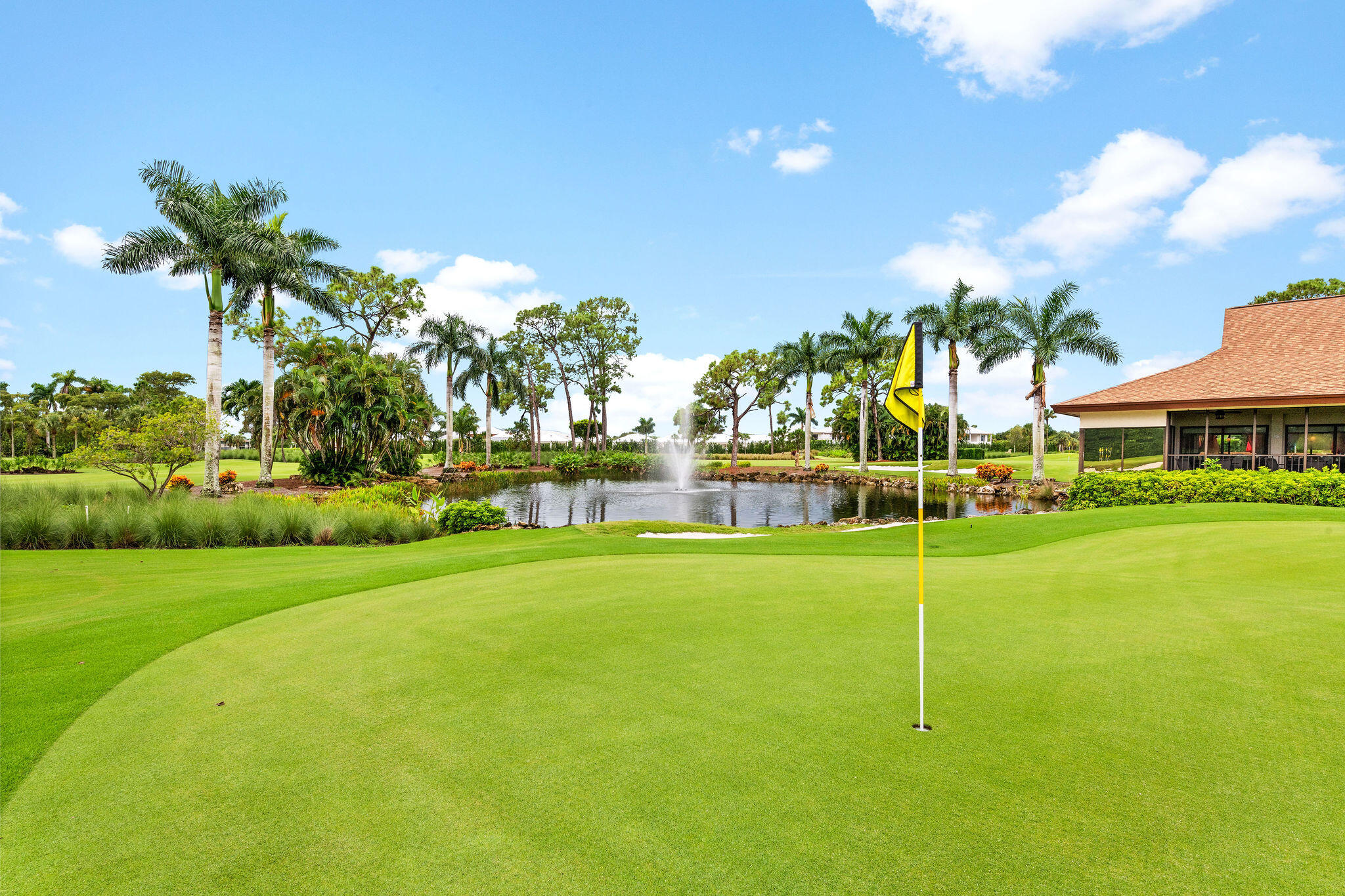 355 Palm Drive, Unit 2 Naples, FL 34112 - Photo 30 of 30 a view of a house with a big yard
