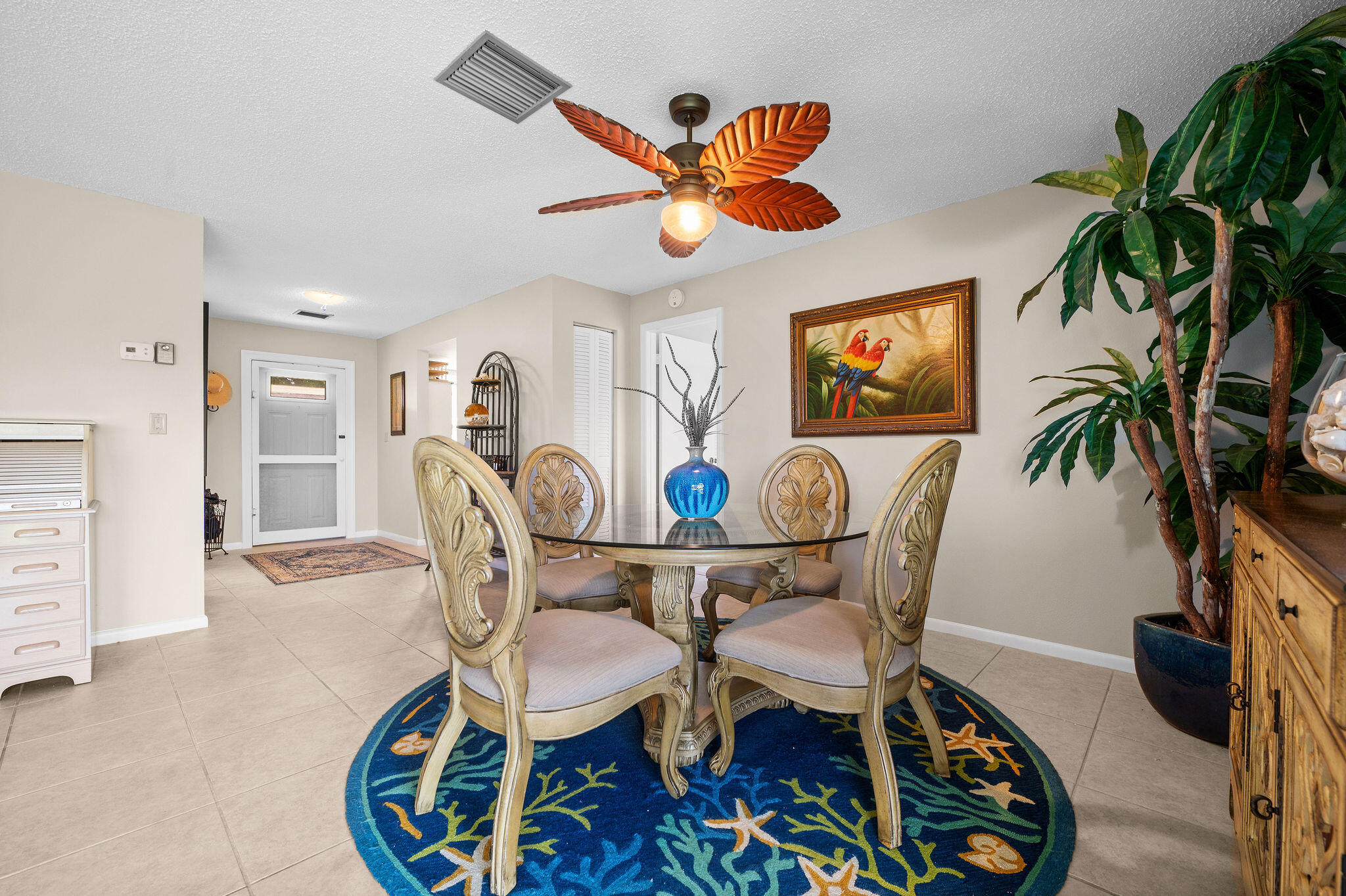 355 Palm Drive, Unit 2 Naples, FL 34112 - Photo 6 of 30 a dining room with furniture and window