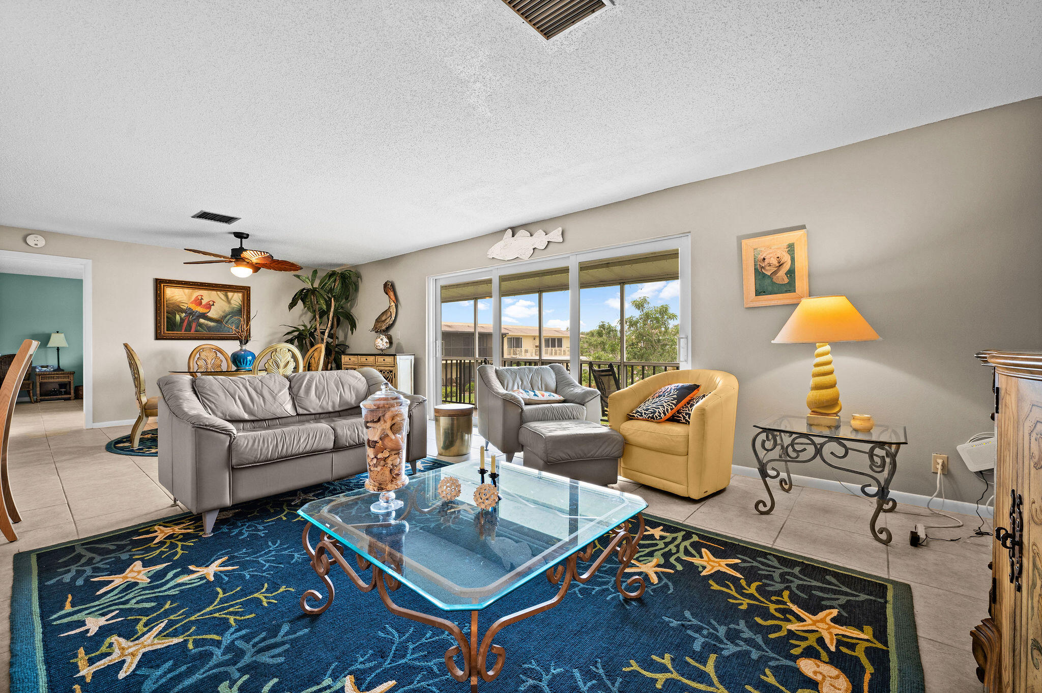 355 Palm Drive, Unit 2 Naples, FL 34112 - Photo 10 of 30 a living room with furniture and a table