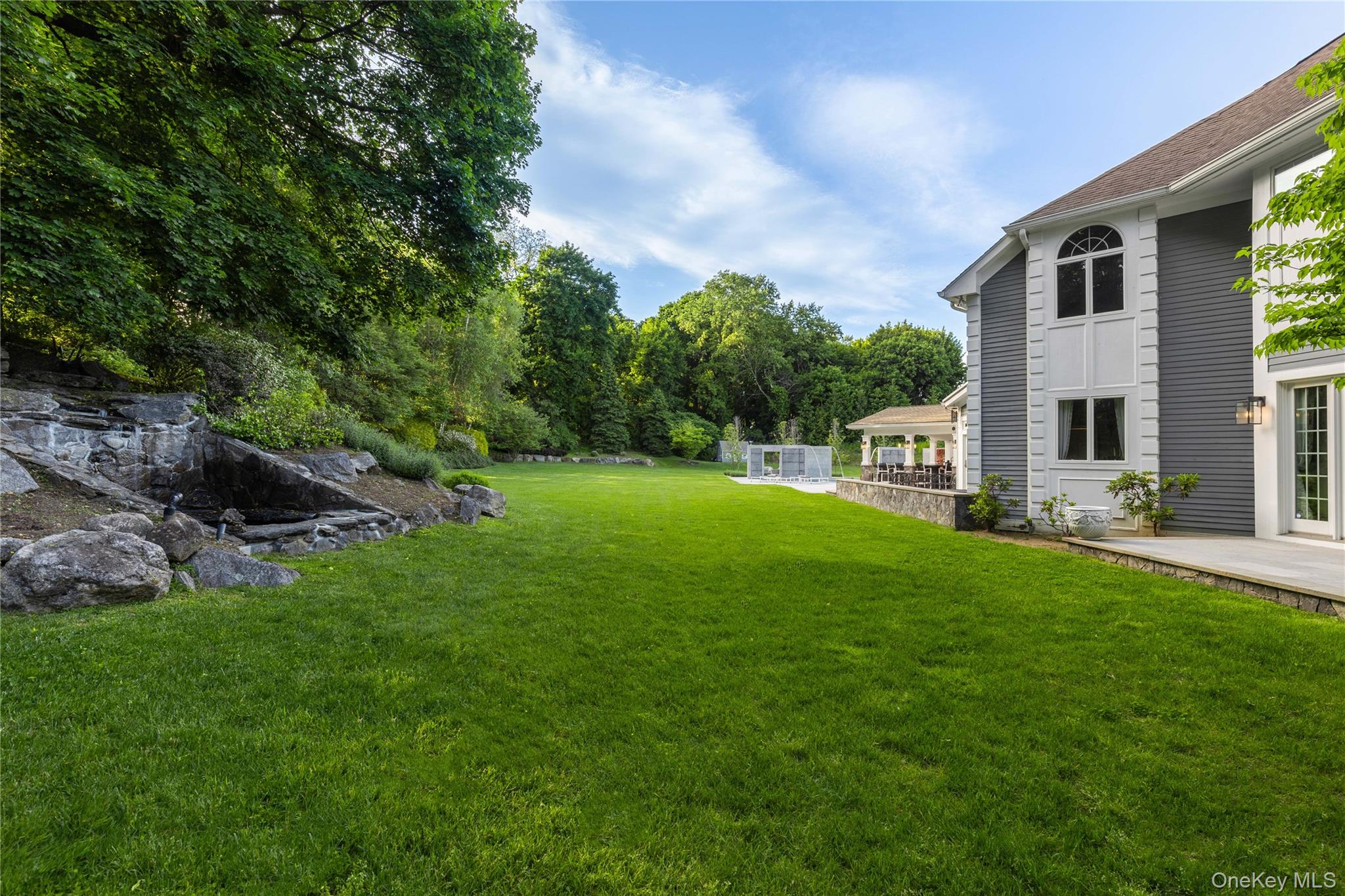 23 Pheasant Drive Rye, NY 10580 - Photo 35 of 35 Flat, fenced back garden that is perfect for a soccer game or tented event