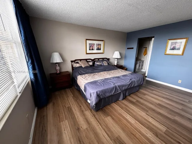 a living room with granite countertop furniture and a lamp