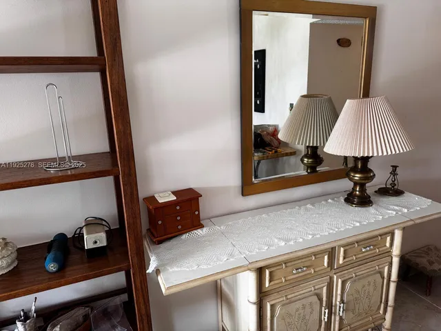 a view of a room with rack on the wall