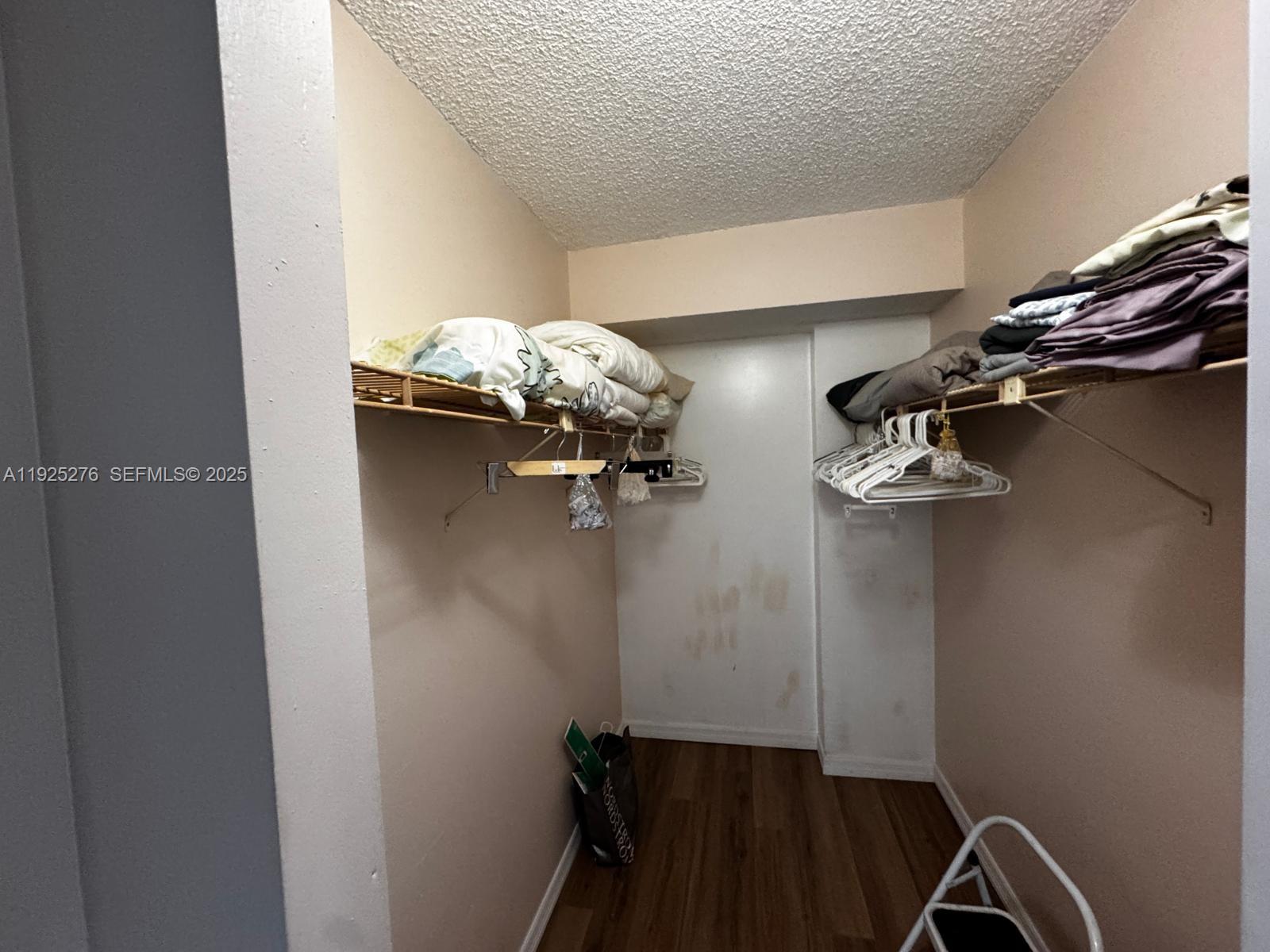 3671 Environ Boulevard, Unit 369 Lauderhill, FL 33319 - Photo 8 of 21 a view of a room with rack on the wall