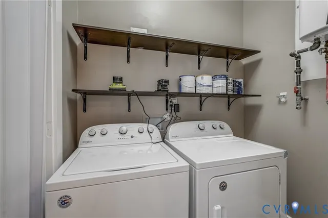 a bathroom with a granite countertop shower a sink and a mirror