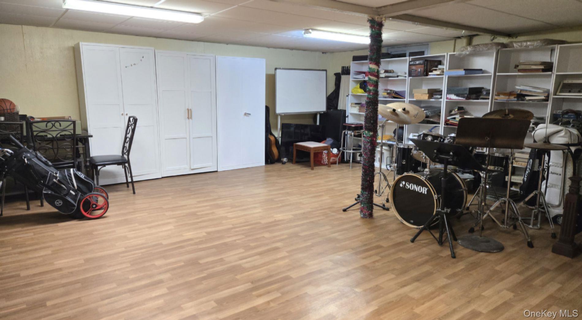 257 Schenck Avenue Great Neck, NY 11021 - Photo 8 of 9 a view of a room with gym equipment
