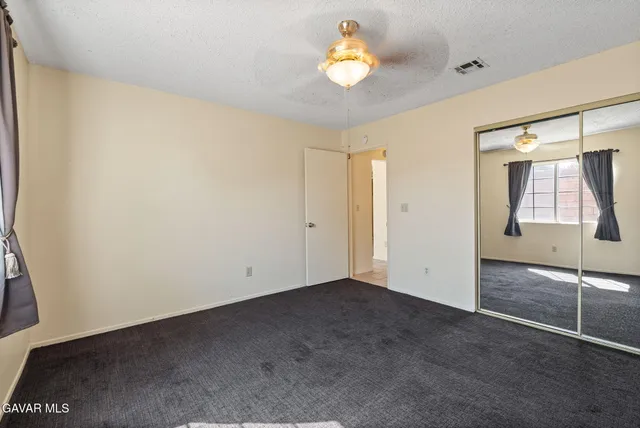 a view of a bathroom from a hallway