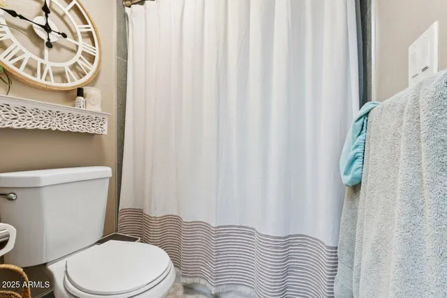 a bed room with a bed and a desk