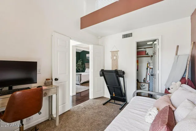 a view of a balcony with a floor to ceiling window