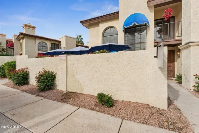 a front view of a house with yard