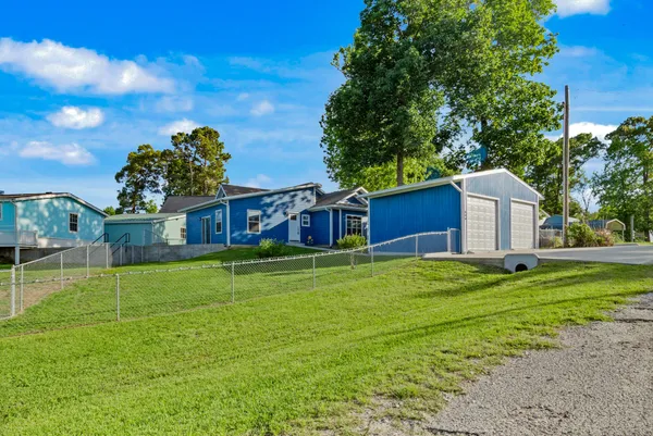 a fire hydrant in the middle of a field