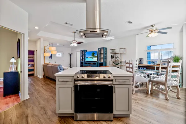 a kitchen with appliances cabinets and a window