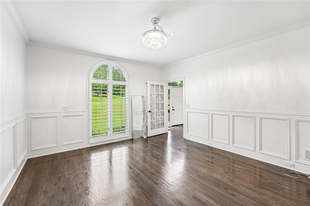1091 Fieldstone Trail Milton, GA 30004 - Photo 27 of 84 a view of an empty room with a window and wooden floor