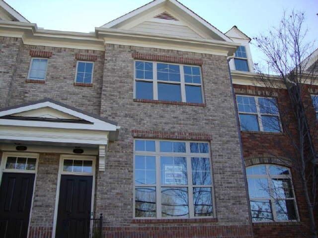 1219 Lavista Road Northeast, Unit 6 Atlanta, GA 30324 - Photo 1 of 1 a front view of a house with a door