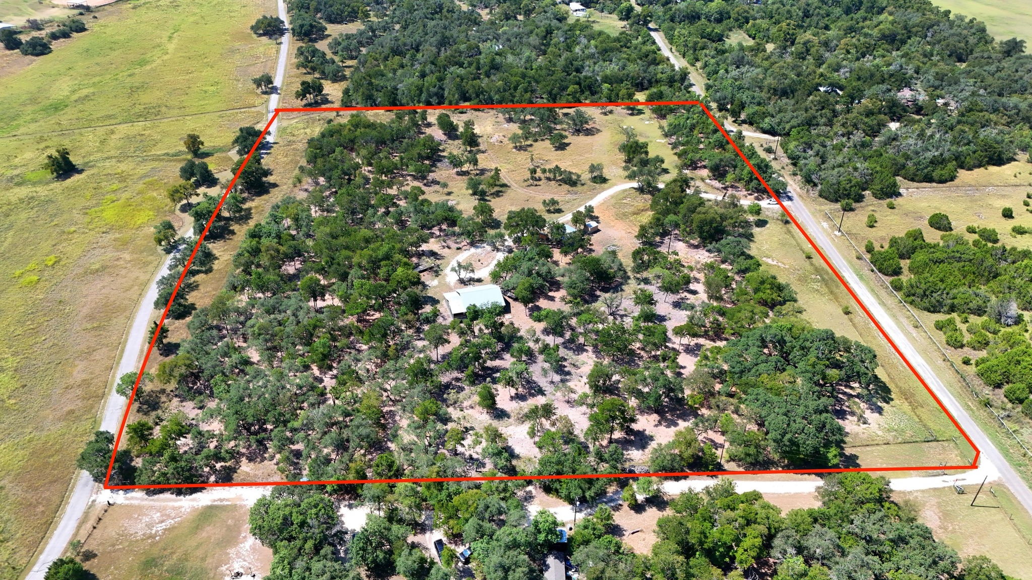 400 Redbird Road Granger, TX 76530 - Photo 1 of 1 Aerial view of sparsely populated area with property boundaries highlighted