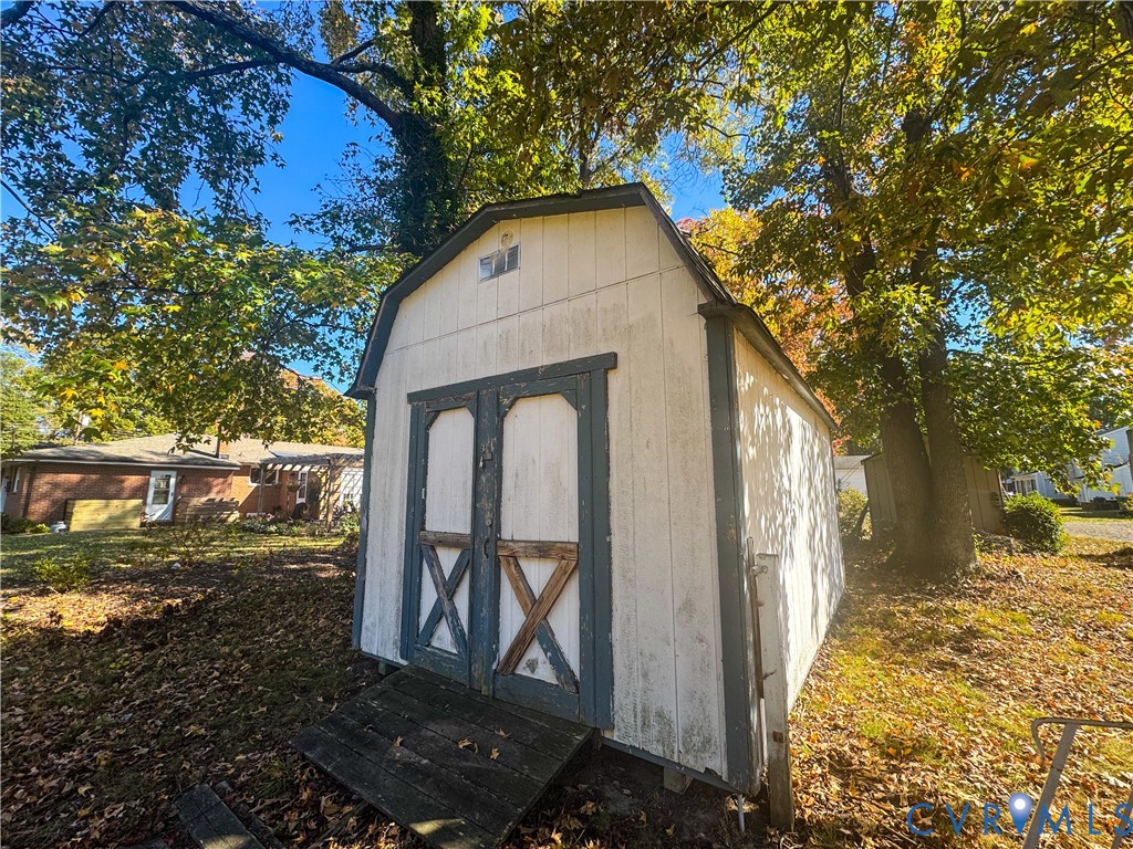 1706 Hungary Road Henrico, VA 23228 - Photo 27 of 28 a view of a small house with a yard