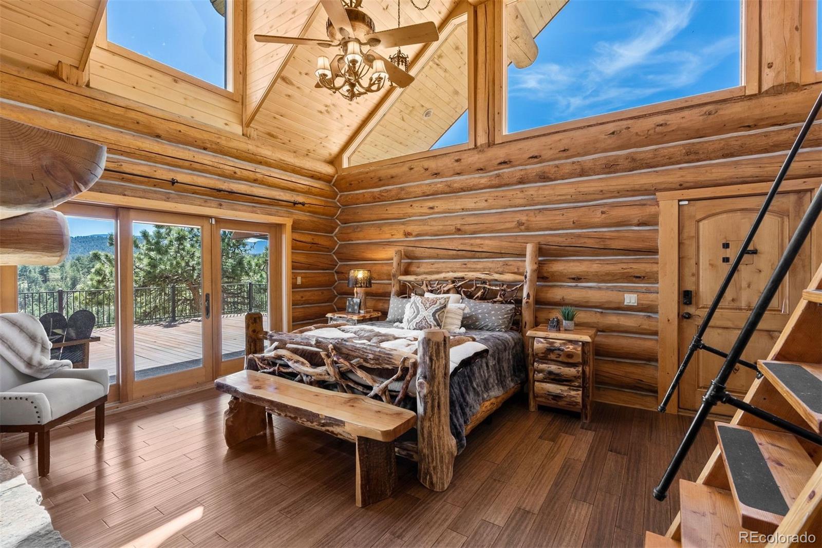 217 North Hill Drive Bailey, CO 80421 - Photo 20 of 49 a bed room with furniture and a window