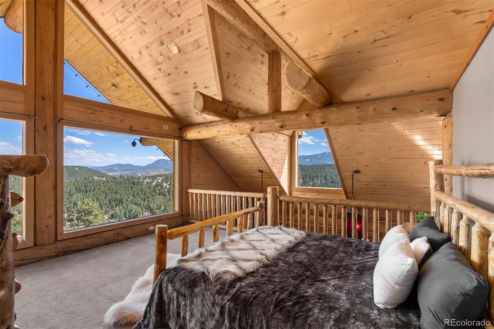 217 North Hill Drive Bailey, CO 80421 - Photo 35 of 49 a view of balcony with furniture