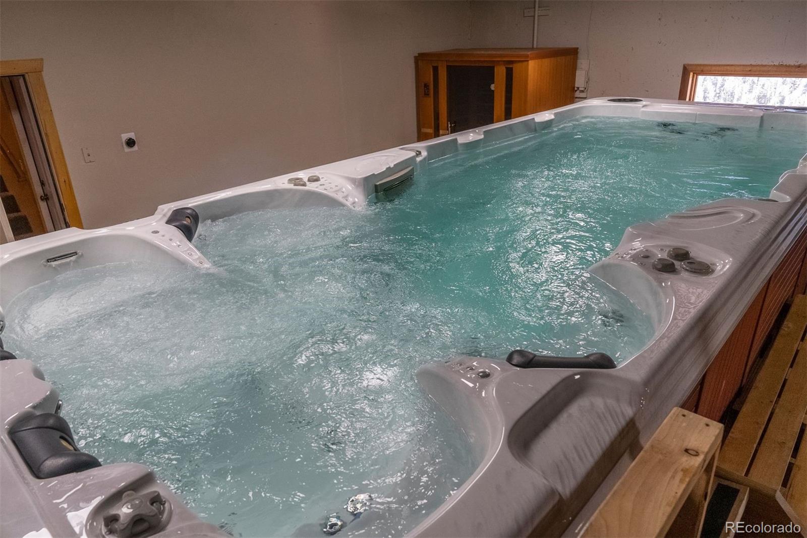 217 North Hill Drive Bailey, CO 80421 - Photo 37 of 49 a view of a balcony with a yard