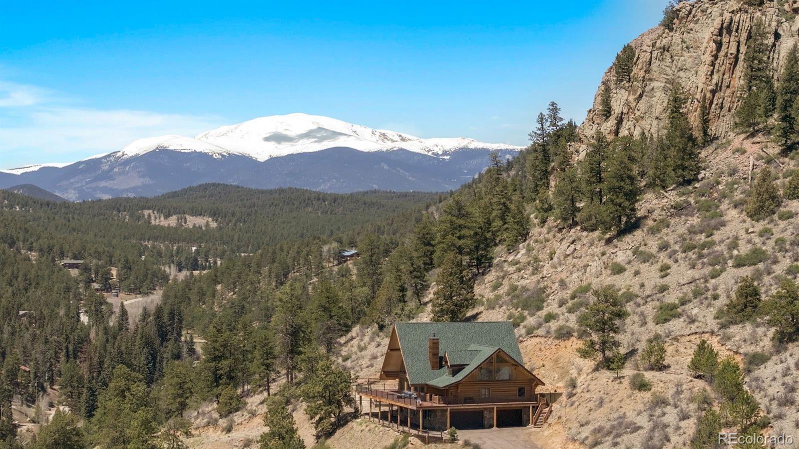 217 North Hill Drive Bailey, CO 80421 - Photo 43 of 49 a view of a house with a mountain