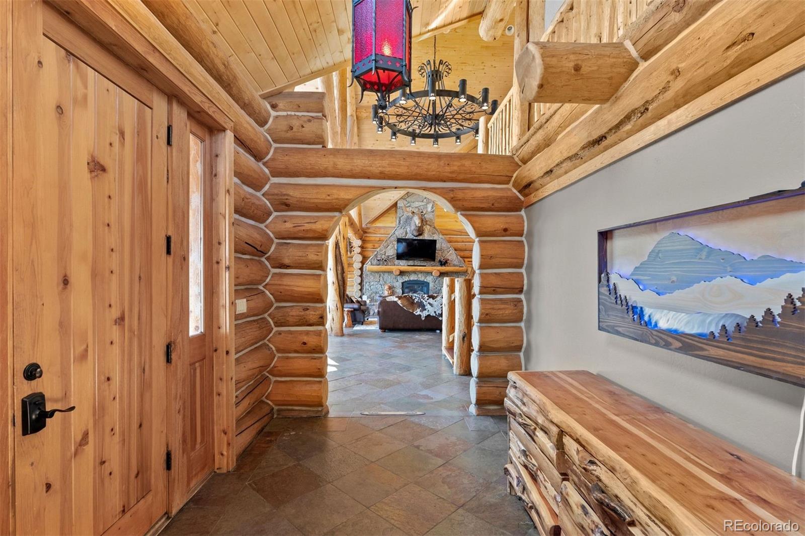 217 North Hill Drive Bailey, CO 80421 - Photo 7 of 49 a view of a livingroom with furniture and a window