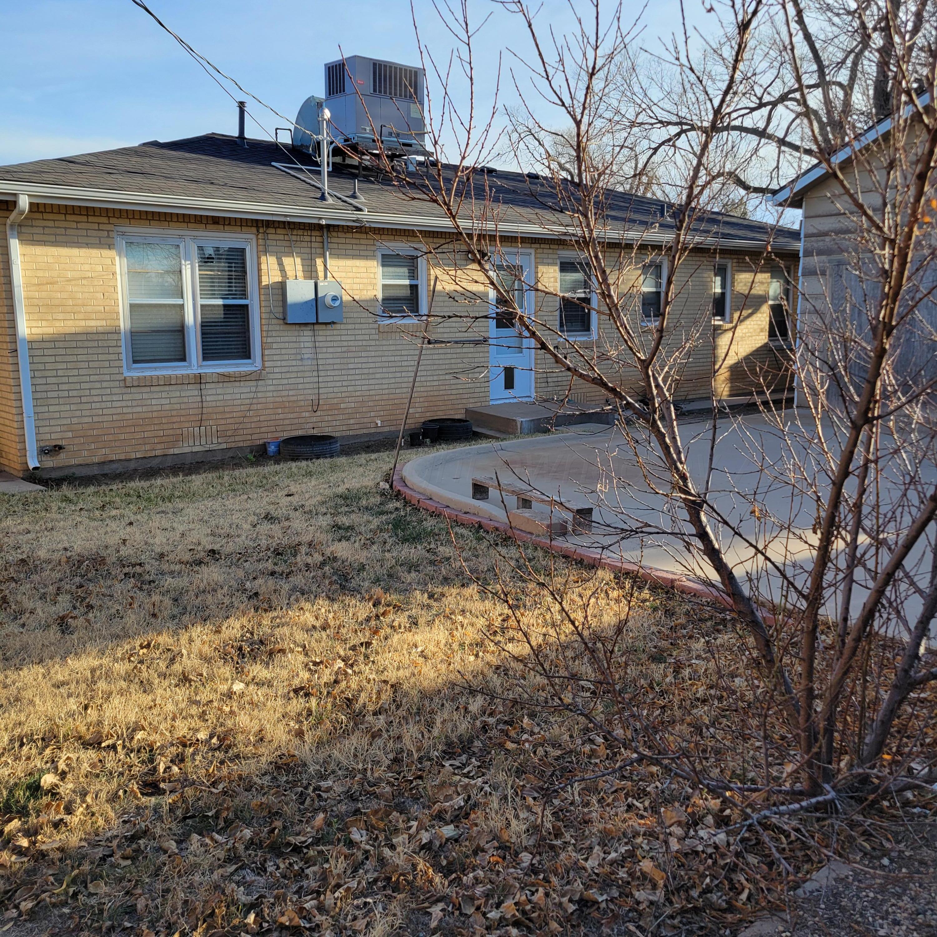 1806 Chama Street Amarillo, TX 79102 - Photo 14 of 15 a view of a house with a yard