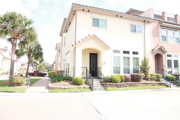 a front view of a building with street view